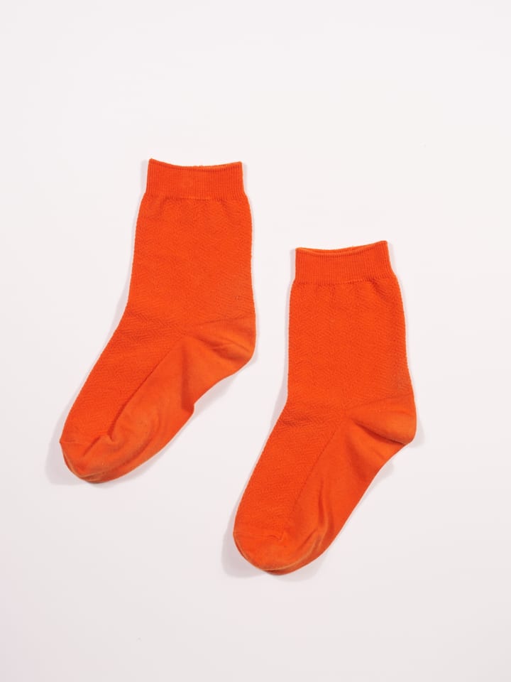 オレンジ色の靴下