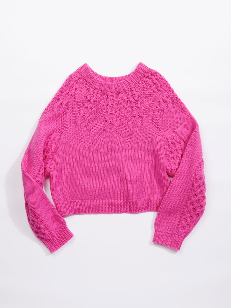 ピンクのセーター